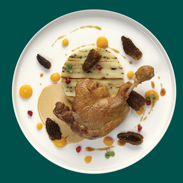 Cuisse de canard confite, pressé de pommes de terre à la truffe, morilles et mousseline de butternutà la Kumquat